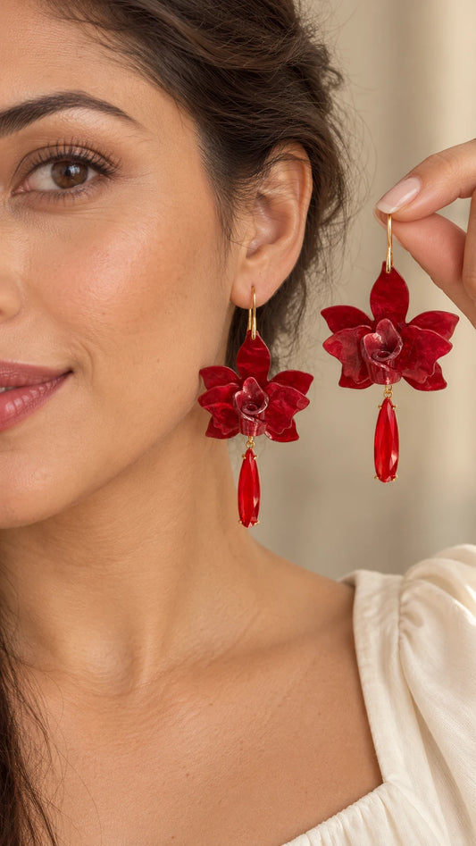 Aros flor de acrílico rojo con gota de cristal y baño de oro