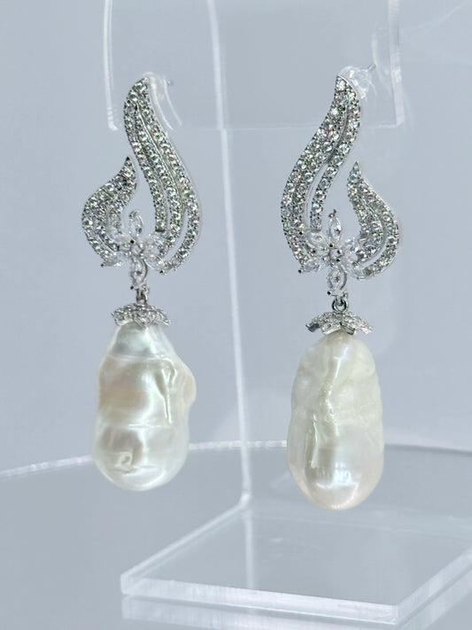 aros circones plata rodinada con perla barroca natural