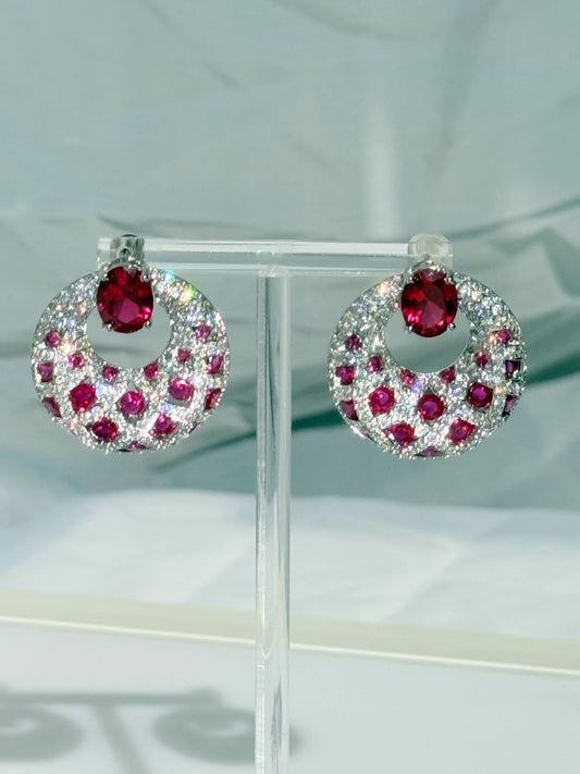 Aros circones rojo rubí y traslúcidos plata 925 bañado en rodio 