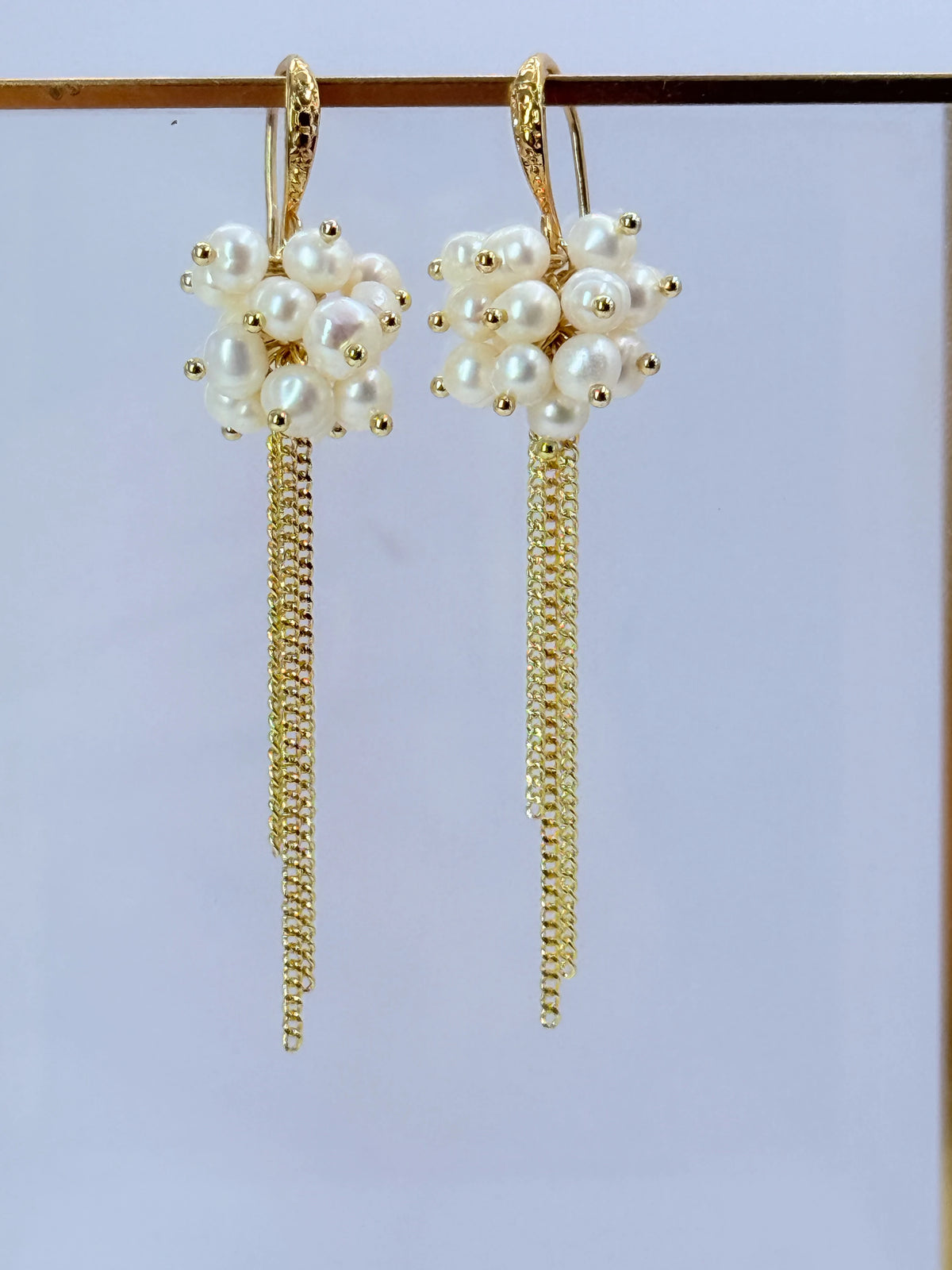 Aros racimo de perlas con cadenas colgantes