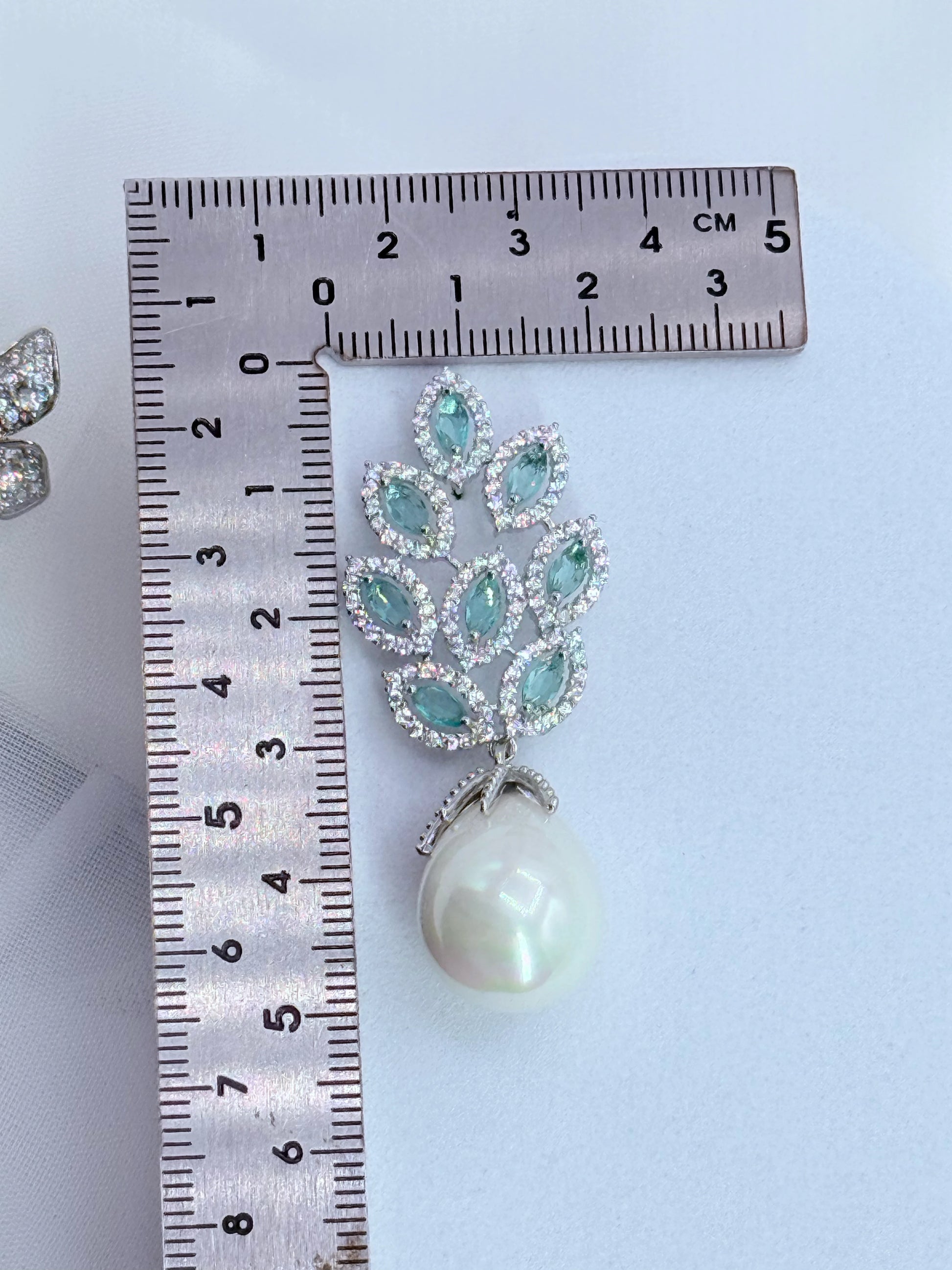 Aros circones y perla shell 