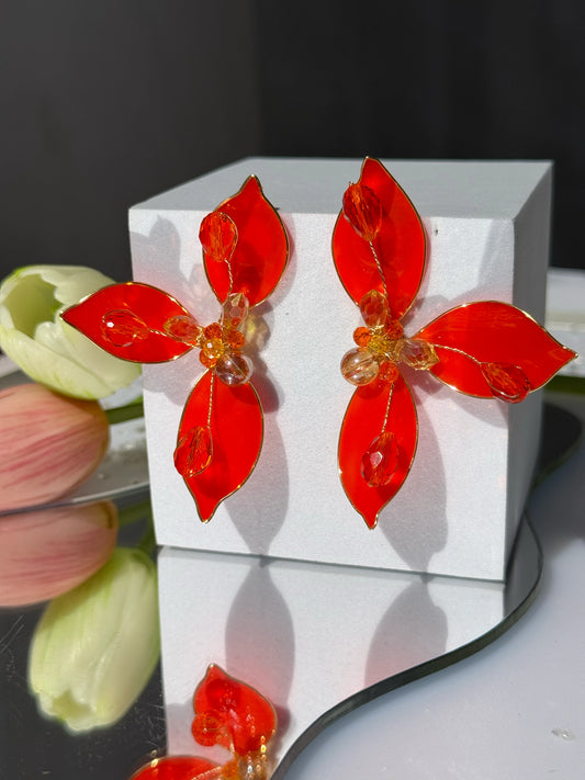 aros flor naranja intenso con cristales elegantes