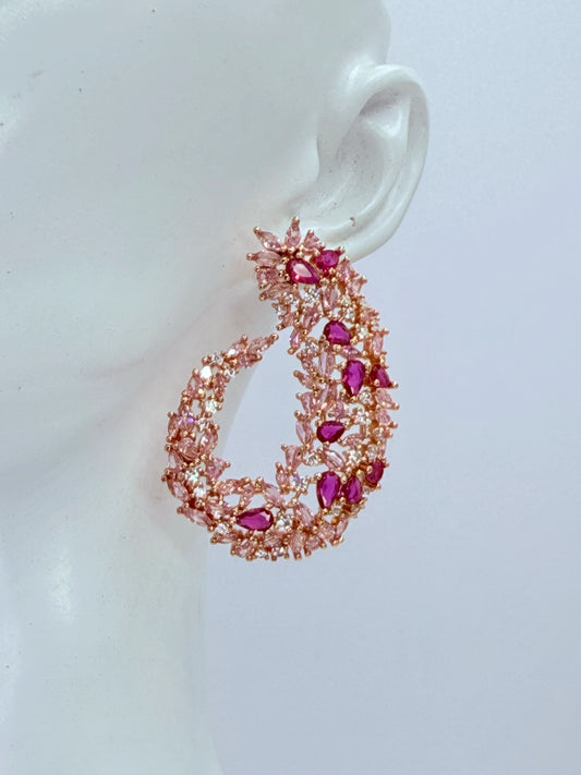 Aros espiral floral fucsia rosa circonitas oro rosado rose gold - La Merced Joyas
