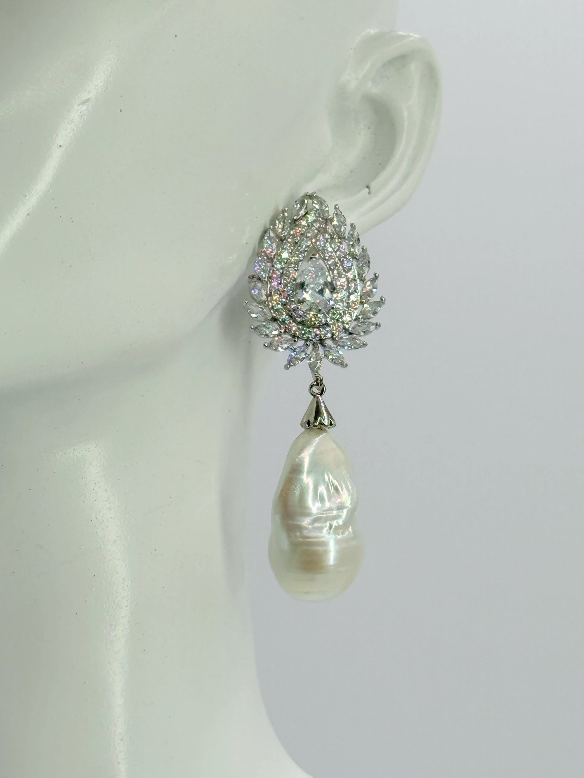 aros circones plata rodinada con perla barroca natural